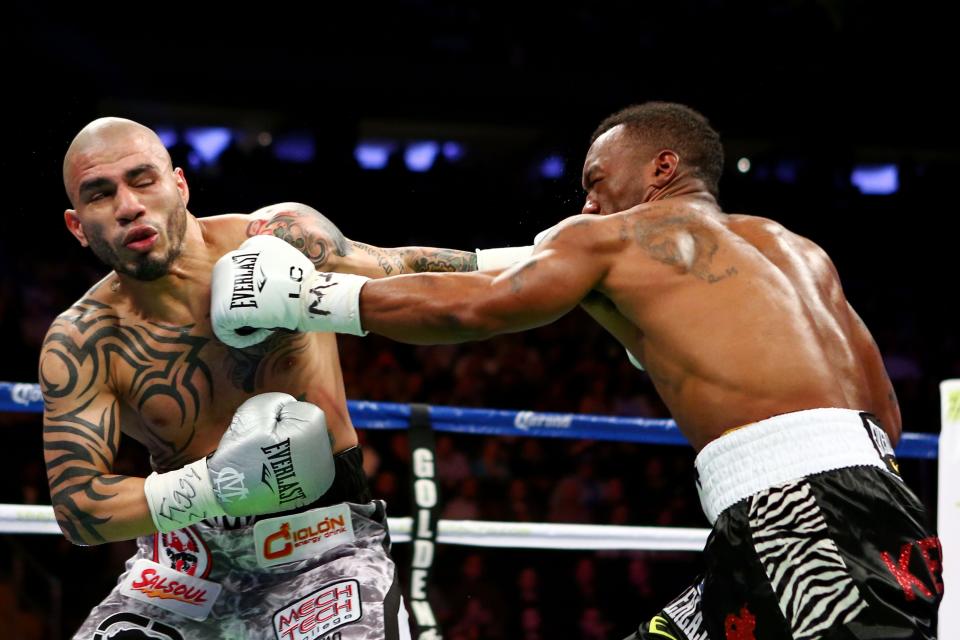 NEW YORK, NY - DECEMBER 01: Austin Trout (R) connects on a punch to the face of fights Miguel Cotto in their WBA Super Welterweight Championship title fight at Madison Square Garden on December 1, 2012 in New York City. (Photo by Elsa/Getty Images)