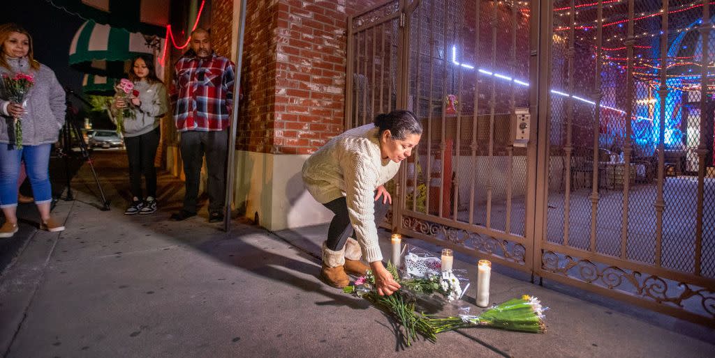 monterey park, ca january 22 after police tape was taken down, people line up to place flowers at the entrance to the star dance studio ballroom where huu can tran, a 72 year old asian male, is accused of shooting and killing 10 people and injuring 10 during the monterey park mass shooting that took place saturday night photo taken sunday, jan 22, 2023 allen j schaben los angeles times via getty images