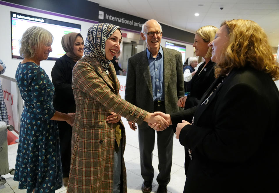 Scotland Office minister Kirsty McNeill and Scottish Education Secretary Jenny Gulruth were at the ariport to greet the women, along with John and Lorna Norgrove (Andrew Milligan/PA)