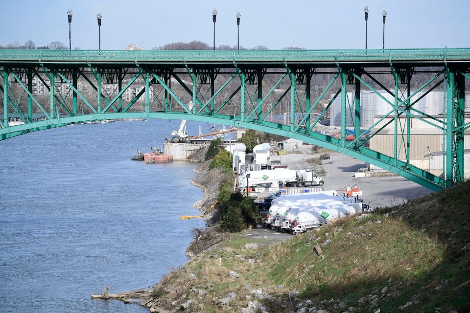 Industrial businesses along the Tennessee River, including Holston Gases pictured here, have kept the South Waterfront from being more developed with public uses in Knoxville. Experts have identified this area as a strong candidate for a waterside "statement piece" similar to the Tennessee Aquarium in Chattanooga or the Rock & Roll Hall of Fame in Cleveland, Ohio.