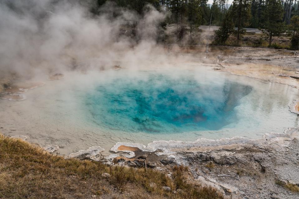 Steam rises off Silex Spring in Lower Geyser Basin in Yellowstone National Park, Wyoming.
