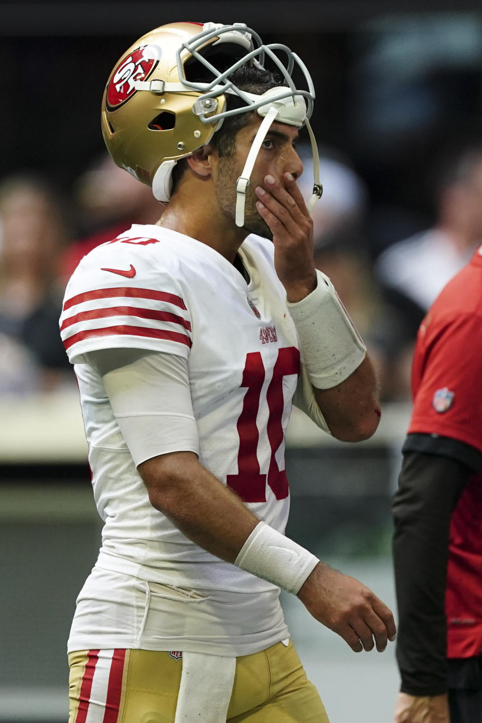 San Francisco 49ers quarterback Jimmy Garoppolo (10) leaves the field after an NFL football game against the Atlanta Falcons, Sunday, Oct. 16, 2022, in Atlanta. The Atlanta Falcons won 28-14. (AP Photo/John Bazemore)