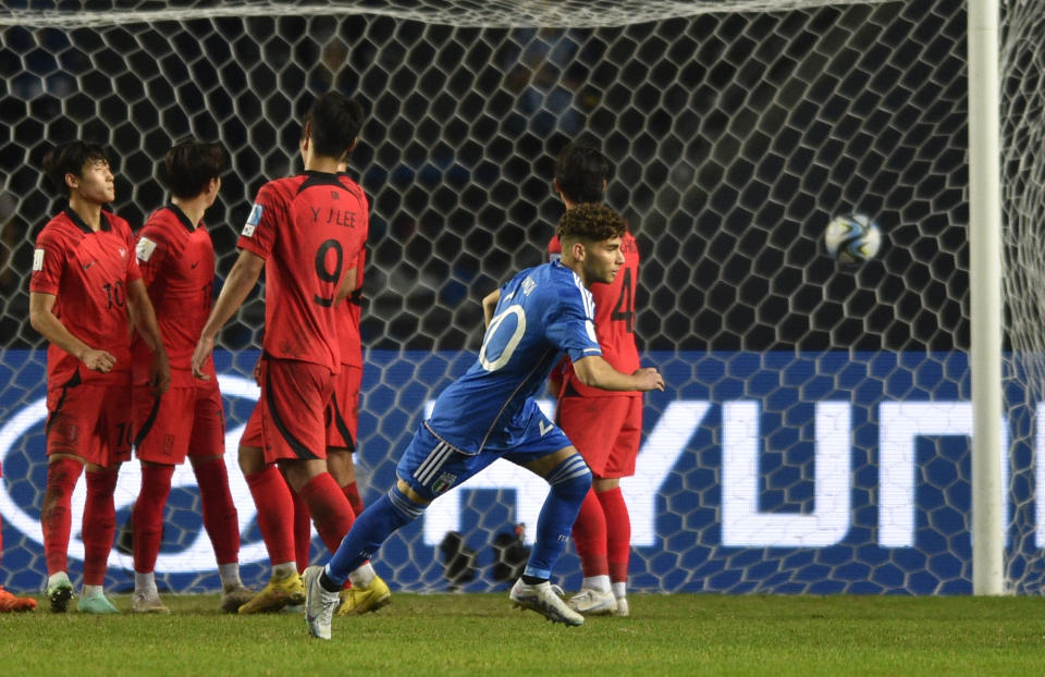 Italy's Simone Pafundi celebrates scoring his side's second goal against South Korea during a FIFA U-20 World Cup semifinal soccer match at Diego Maradona stadium in La Plata, Argentina, Thursday, June 8, 2023. (AP Photo/Gustavo Garello)