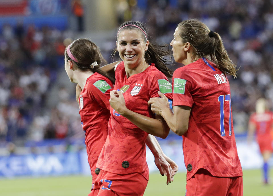 United States' Alex Morgan celebrates after scoring her side's second goal during the Women's World Cup semifinal soccer match between England and the United States, at the Stade de Lyon, outside Lyon, France, Tuesday, July 2, 2019. (AP Photo/Alessandra Tarantino)