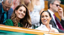 <p>The Duchess of Sussex and the Duchess of Cambridge watch the Ladies Singles Final at Wimbledon in 2019. (Getty Images)</p> 