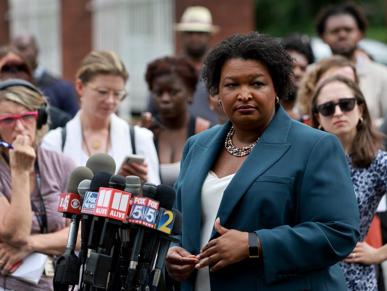 Democratic gubernatorial candidate Stacey Abrams speaks to the media during a press conference