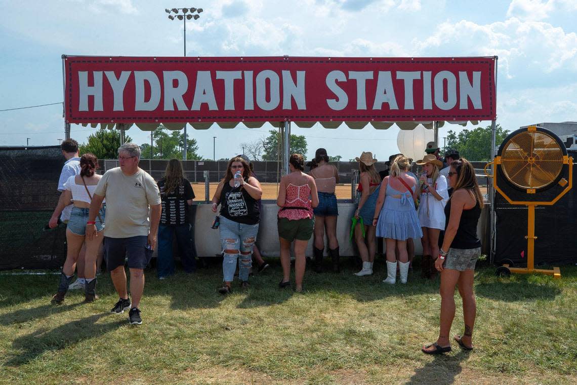 Fans refill water bottles at the Railbird Music Festival at Red Mile in Lexington, Ky., on Saturday, June 3, 2023. The festival went off without any major incidents, which was not the case two years ago at Keeneland when attendees complained of long lines for water.
