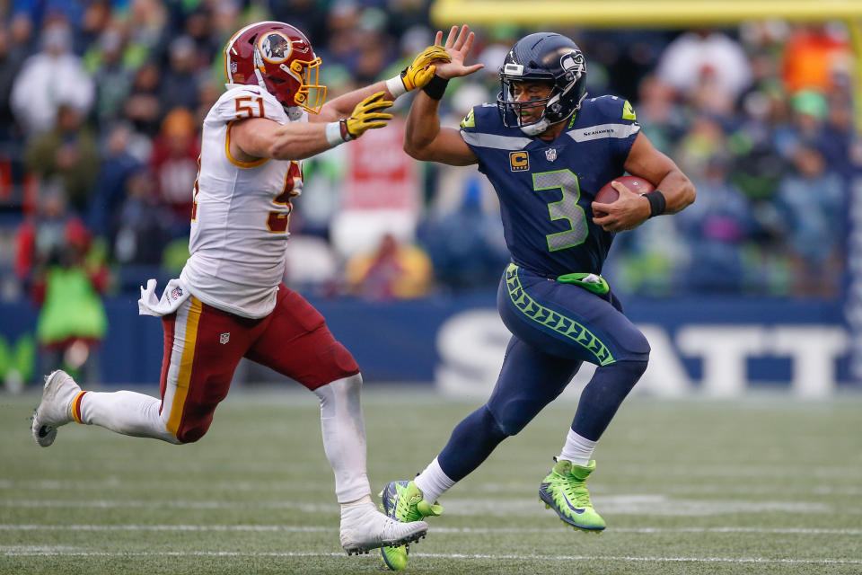 <p>Quarterback Russell Wilson #3 of the Seattle Seahawks rushes against linebacker Will Compton #51 of the Washington Redskins at CenturyLink Field on November 5, 2017 in Seattle, Washington. The Redskins beat the Seahawks 17-14. (Photo by Otto Greule Jr/Getty Images) </p>