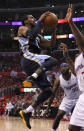 LOS ANGELES, CA - MAY 05: Mike Conley #11 of the Memphis Grizzlies goes up for a shot against the Los Angeles Clippers in Game Three of the Western Conference Quarterfinals in the 2012 NBA Playoffs on May 5, 2011 at Staples Center in Los Angeles, California. The Clippers won 87-86 to take a two games to one lead in the series. NOTE TO USER: User expressly acknowledges and agrees that, by downloading and or using this photograph, User is consenting to the terms and conditions of the Getty Images License Agreement. (Photo by Stephen Dunn/Getty Images)