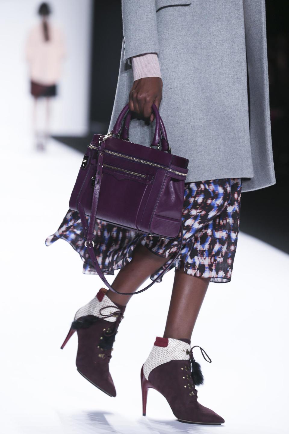 The Rebecca Minkoff Fall 2014 collection is modeled during Fashion Week, Friday, Feb. 7, 2014, in New York. (AP Photo/John Minchillo)