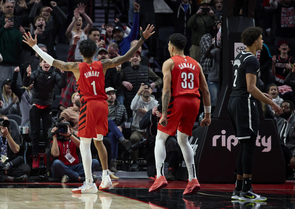 Portland Trail Blazers guard Anfernee Simons (1) gestures after hitting the go-ahead basket against the Brooklyn Nets during the final second of an NBA basketball game in Portland, Ore., Wednesday, Jan. 17, 2024. (AP Photo/Craig Mitchelldyer)