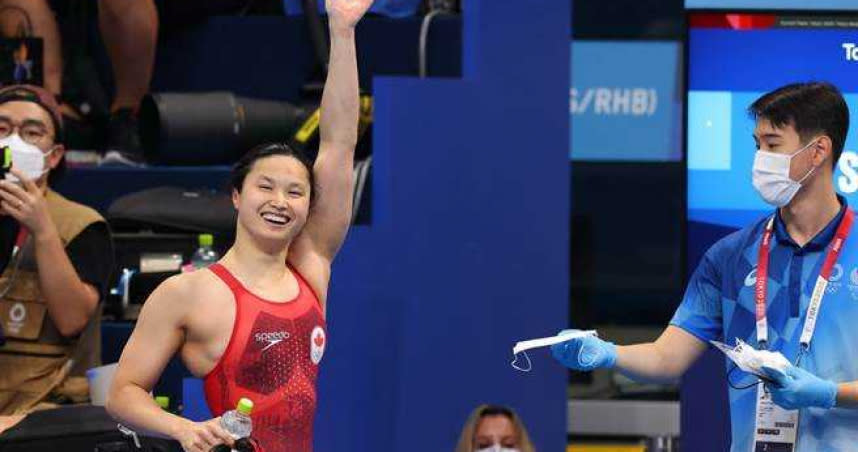 加拿大游泳女將瑪格麗特26日拿下東奧女子100公尺蝶式金牌。（圖／路透社）