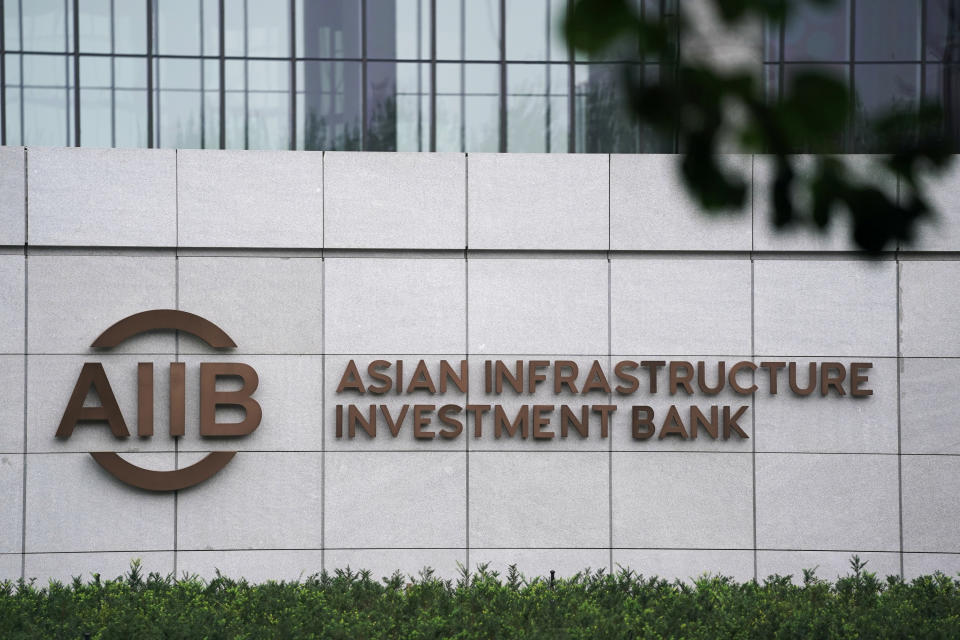 The sign of Asian Infrastructure Investment Bank (AIIB) is pictured at its headquarters in Beijing, China July 27, 2020. REUTERS/Tingshu Wang