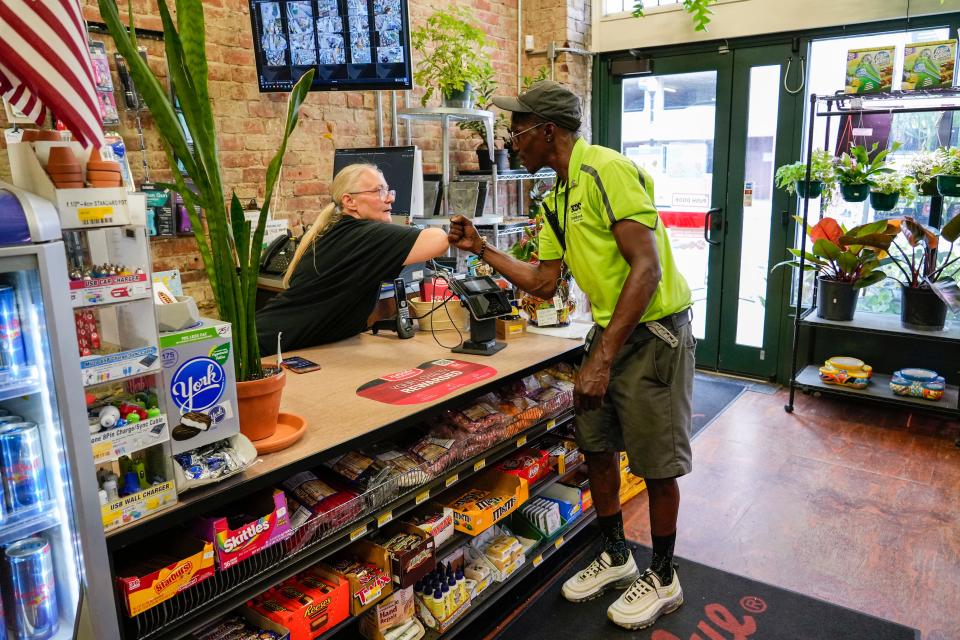 Lashun Woodard is one of 3CDC's more than 80 ambassdors who oversee sections of Downtown Cincinnati and Over-the-Rhine. He conducts business checks along Court Street several times a day and reports any issues or needs to 3CDC.