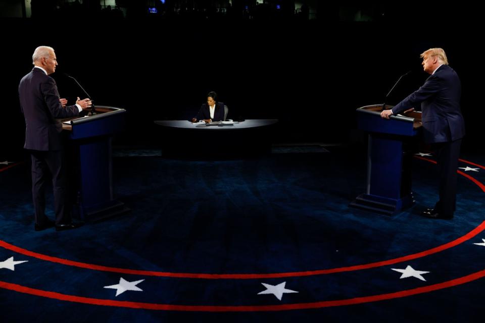 Donald Trump and  Biden together in a presidential debate at Belmont University on 22 October 2020 (Getty Images)