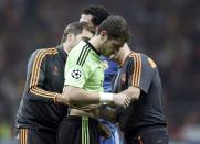 Real Madrid's goalkeeper Iker Casillas reacts to his injury during their Champions League Group B soccer match against Galatasaray at Turk Telekom Arena in Istanbul September 17, 2013. REUTERS/Osman Orsal (TURKEY - Tags: SPORT SOCCER)