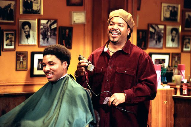 <p>Everett Collection</p> Ice Cube (right) in 'Barbershop'