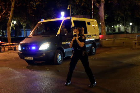 The Spanish Civil Guard van carrying Jordi Cuixart, leader of Omnium Cultural, and Jordi Sanchez of the Catalan National Assembly (ANC), leaves the High Court in Madrid, Spain, October 16, 2017. REUTERS/Susana Vera