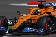 <p>McLaren's Spanish driver Carlos Sainz Jr steers his car during the qualifying session for the Formula One British Grand Prix at the Silverstone motor racing circuit in Silverstone, central England on August 1, 2020.</p>