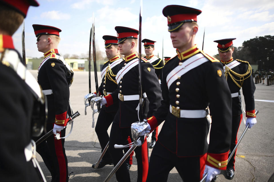 Members of the Household Cavalry, The Blues and Royals rehearsing for Britain's Prince Philip's funeral on the Drill Square at the Army Training Centre Pirbright in Woking, Surrey, England Wednesday April 14, 2021. Prince Philip's funeral will be held at Windsor Castle on Saturday following his death at the age of 99 on April 10. (Victoria Jones/PA via AP)