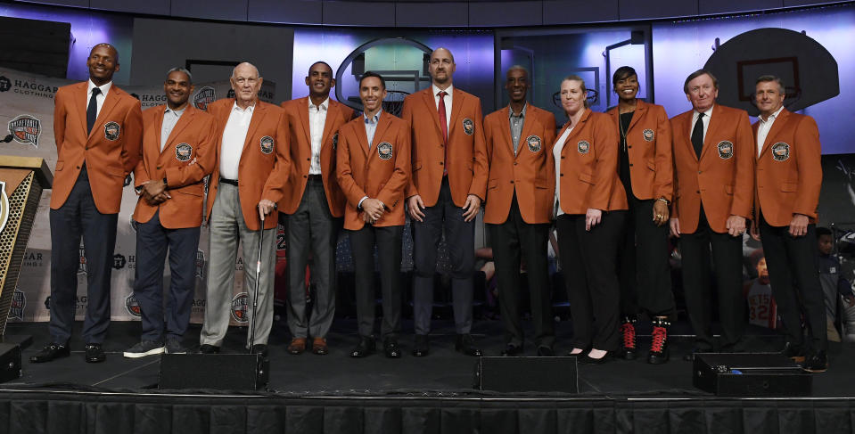 The class of 2018 inductees into the Basketball Hall of Fame, from left, Ray Allen, Maurice Cheeks, Charles "Lefty" Driesell, Grant Hill, Steve Nash, Dino Radja, Charlie Scott, Katie Smith, Tina Thompson, Rod Thorn, and Rick Welts pose for a photograph during a news conference at the Naismith Memorial Basketball Hall of Fame, Thursday, Sept. 6, 2018, in Springfield, Mass. (AP Photo/Jessica Hill)