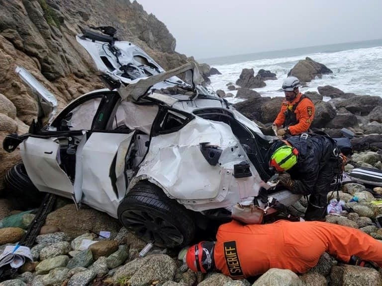 Emergency workers at the site of Devil's Slide accident.