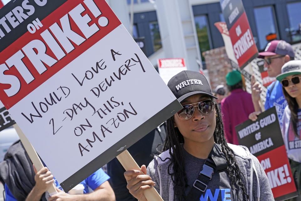 Members of the The Writers Guild of America picket outside of the Amazon Studios lot, Tuesday, May 2, 2023, in Culver City, Calif. (AP Photo/Marcio Jose Sanchez)