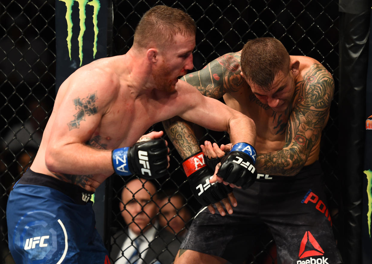 GLENDALE, AZ - APRIL 14:  (L-R) Justin Gaethje punches Dustin Poirier in their lightweight fight during the UFC Fight Night event at the Gila Rivera Arena on April 14, 2018 in Glendale, Arizona. (Photo by Josh Hedges/Zuffa LLC/Zuffa LLC via Getty Images)