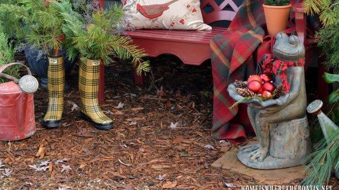 greenery and pine cone window boxes