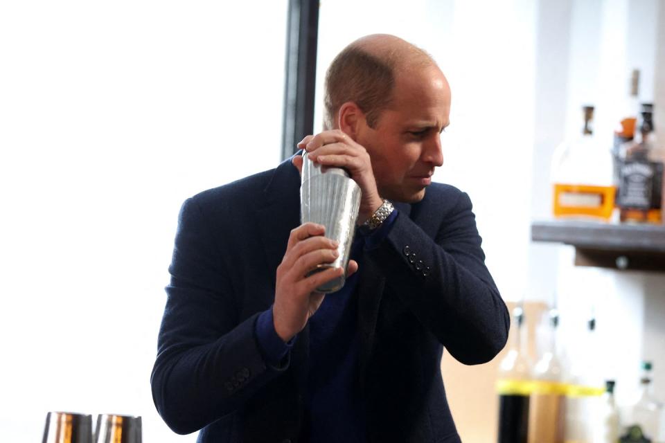 <p>Prince William took his cocktail-making duties very seriously.</p>