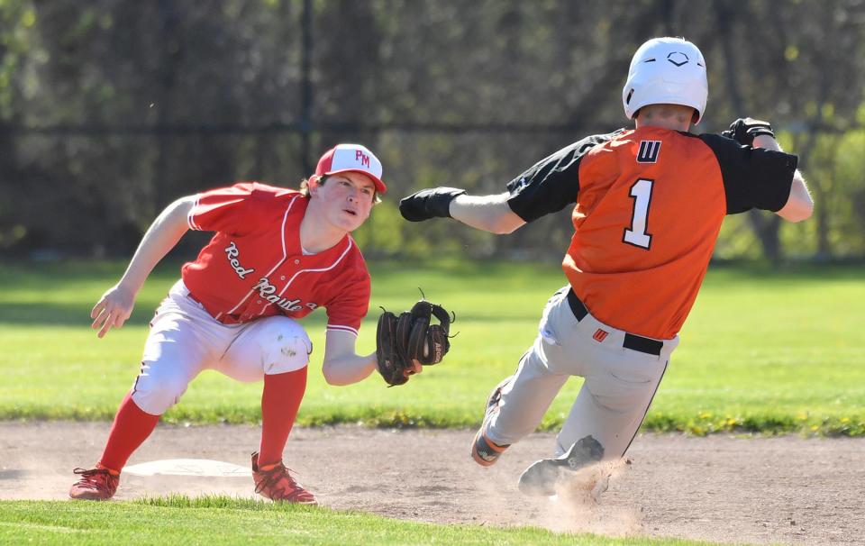 Pal-Mac's Paul Goodness puts the tag on Waterloo's Casey Burcroff at second base.