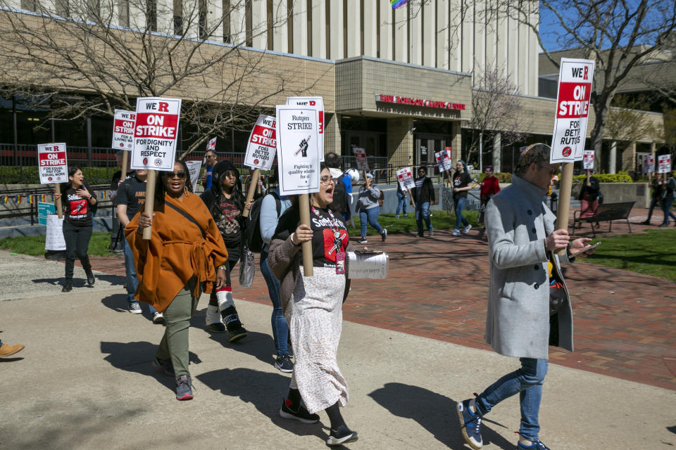 Professors, part-time lecturers, and graduate students strike at Rutgers University in Newark, N.J., Monday, April 10, 2023. Thousands of professors, part-time lecturers and graduate student workers at New Jersey's flagship university have gone on strike — the first such job action in the school's 257-year history. Union leaders say they're demanding salary increases, better job security for adjunct faculty and guaranteed funding for graduate students, among other requests. (AP Photo/Ted Shaffrey)