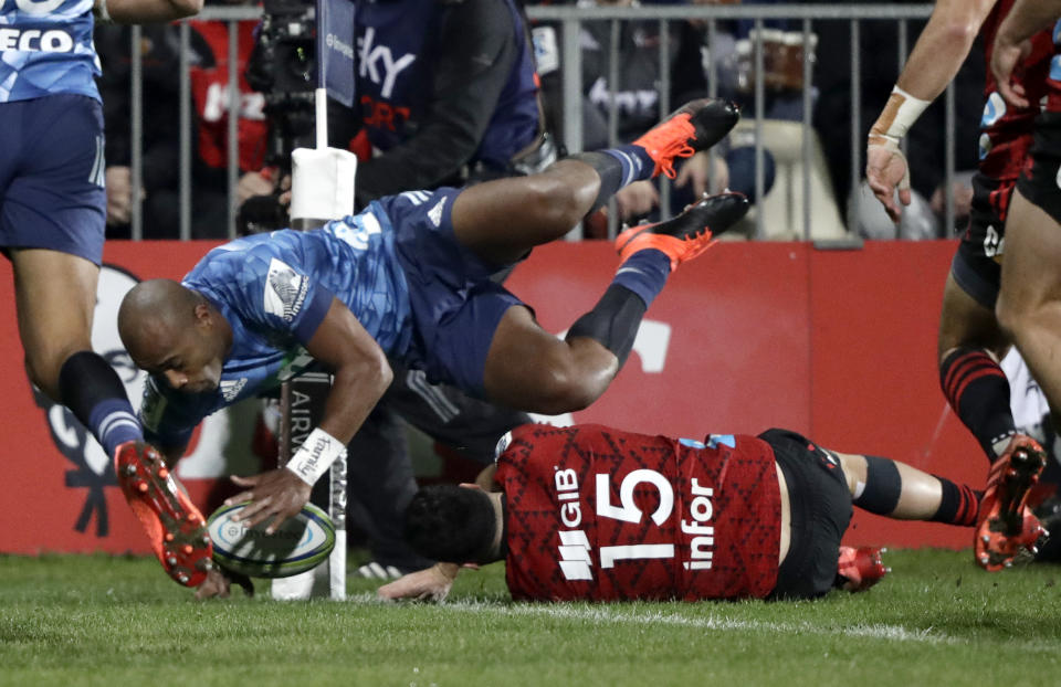 Blues Mark Telea scores his team's first try during the Super Rugby Aotearoa rugby game between the Crusaders and the Blues in Christchurch, New Zealand, Saturday, July 11, 2020. (AP Photo/Mark Baker)