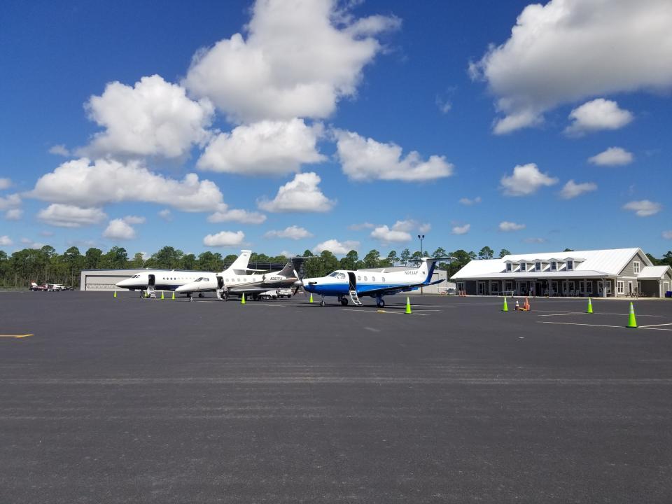 Planes are lined up outside the Cape Fear Jetport terminal. Airport director Howie Franklin said it's not uncommon to see several jets fly in on a single day.