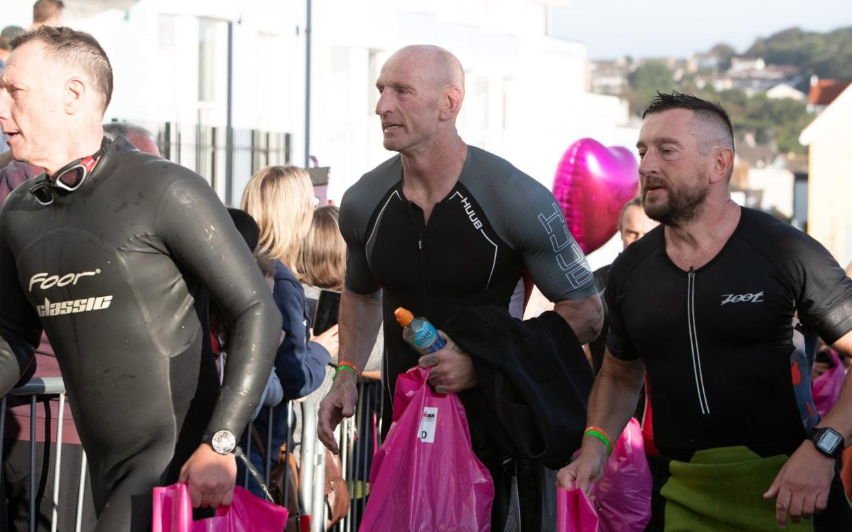 Gareth Thomas competing in an IronMan competition in Tenby, South Wales, after announcing he is HIV positive. Sept 15, 2019. - REX