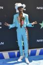 <p>The patterned lapels on this custom suit by Pyer Moss are e-ver-y-thing. At the BET Awards, Lil Nas X also added a pop of white with the matching hat and boots.</p>