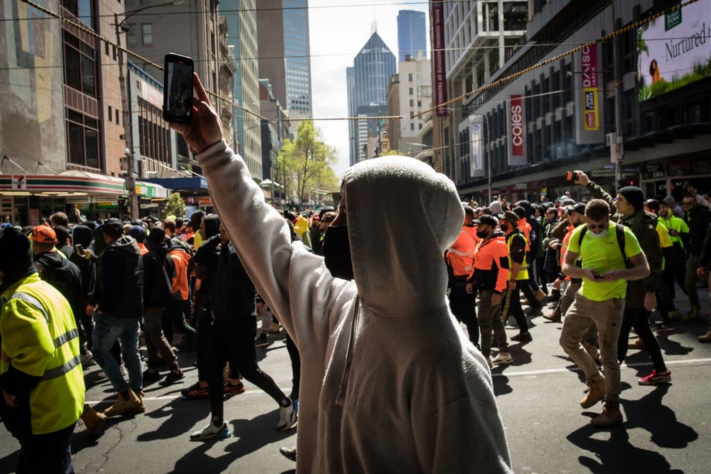 Construction workers march through the streets in Melbourne on Tuesday  (Getty Images)