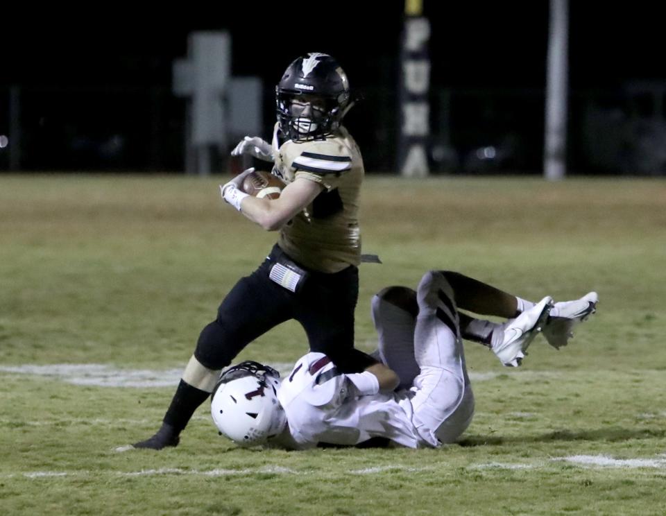 Quanah's Brennan Thomas is brought down by Seymour's David Charro Friday, Nov. 6, 2020, in Quanah.