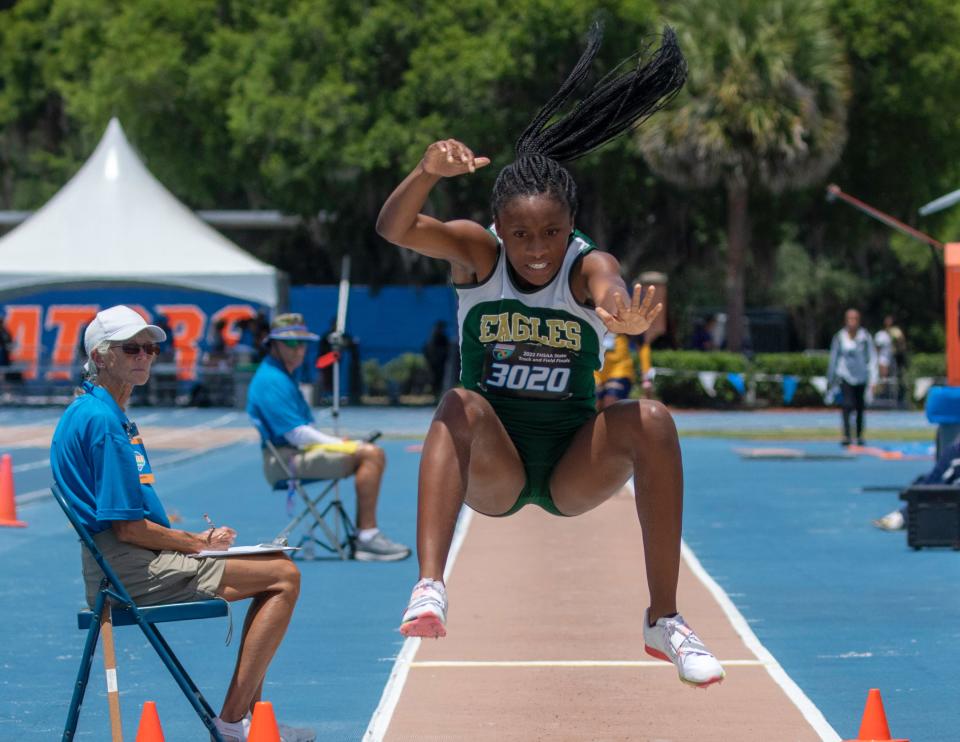 George Jenkins freshman Chelsi Williams competes in the long jump, her first of four events at the Class 4A state track meet in Gainesville. She won the event.
