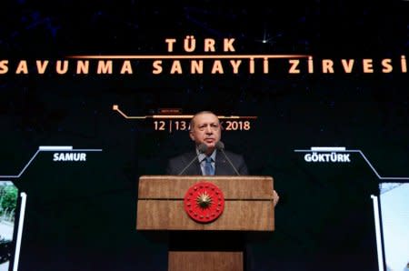 FILE PHOTO: Turkish President Tayyip Erdogan speaks during the Turkish Defense Industry Summit in Ankara, Turkey December 12, 2018. Cem Oksuz/Presidential Press Office/Handout via REUTERS