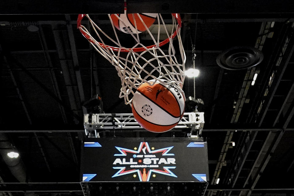 A ball goes through the basket during practice for the WNBA All-Star basketball game in Chicago, Saturday, July 9, 2022. (AP Photo/Nam Y. Huh)