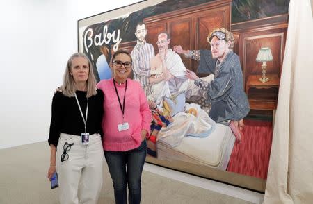 Pauline Daly, Gallery Director of Sadie Coles (L), and Lisa Schiff, President and Senior Advisor SFA Art Advisory, pose in front of "The Fixer (Die Frage ist)" (2018) of German artist Kati Heck during the Art Basel in Basel, Switzerland, June 13, 2018. REUTERS/Moritz Hager