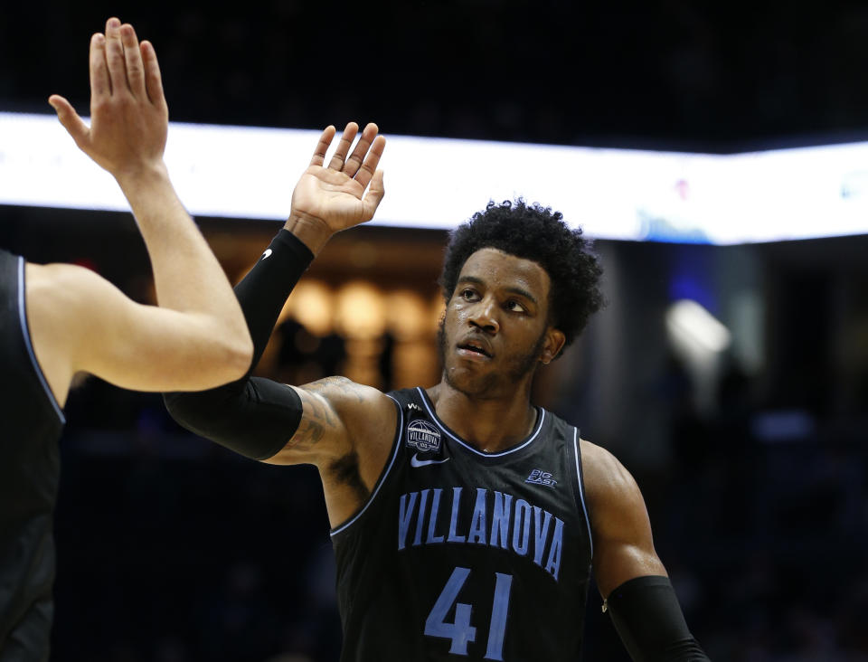 Villanova forward Saddiq Bey (41) celebrates the team's win over Xavier in an NCAA college basketball game, Saturday, Feb. 22, 2020, in Cincinnati. (AP Photo/Gary Landers)