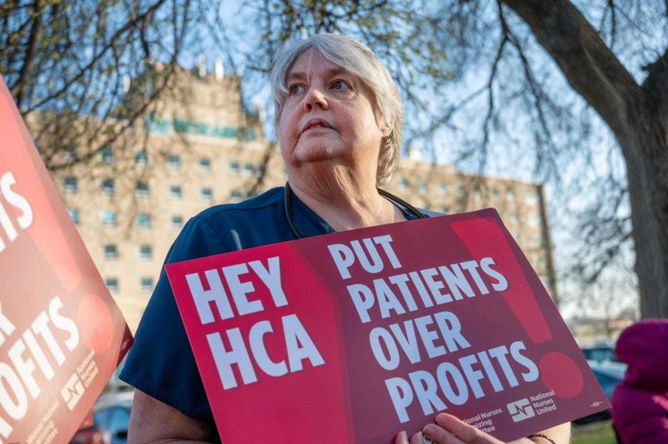 Cheryl Rodarmel, a nurse for the rehabilitation unit, participates in a rally outside of the Research Medical Center building to support ongoing negotiations with HCA regarding contract renegotiations on Tuesday, March 12, 2024, in Kansas City.