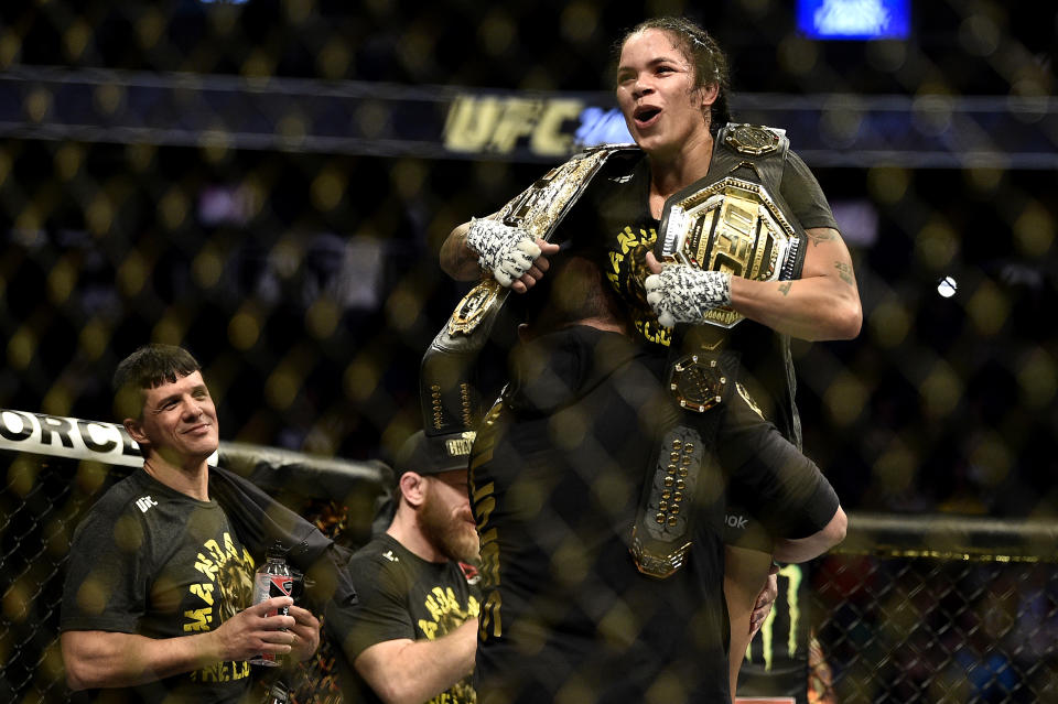 LAS VEGAS, NEVADA - DECEMBER 14:  Amanda Nunes of Brazil celebrates her win over Germaine de Randamie of Netherlands in their UFC women's bantamweight championship bout during the UFC 245 event at T-Mobile Arena on December 14, 2019 in Las Vegas, Nevada. (Photo by Chris Unger/Zuffa LLC)