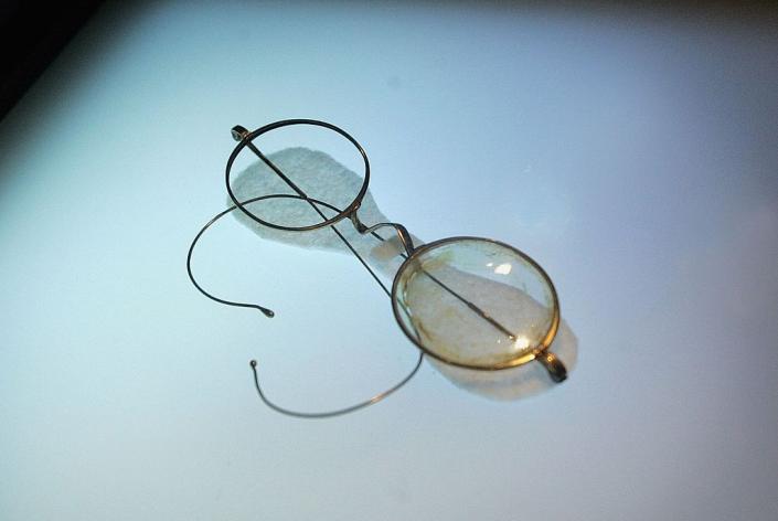 SAN FRANCISCO - JUNE 6: A pair of glasses is displayed in the Titanic: Aritifact Exhibition at the Metreon on June 6, 2006 in San Francisco, California. The exhibition opens on June 10, 2006 and will feature more than 300 authentic artifacts that have been recovered from Titanic&#39;s debris field.  (Photo by David Paul Morris/Getty Images)