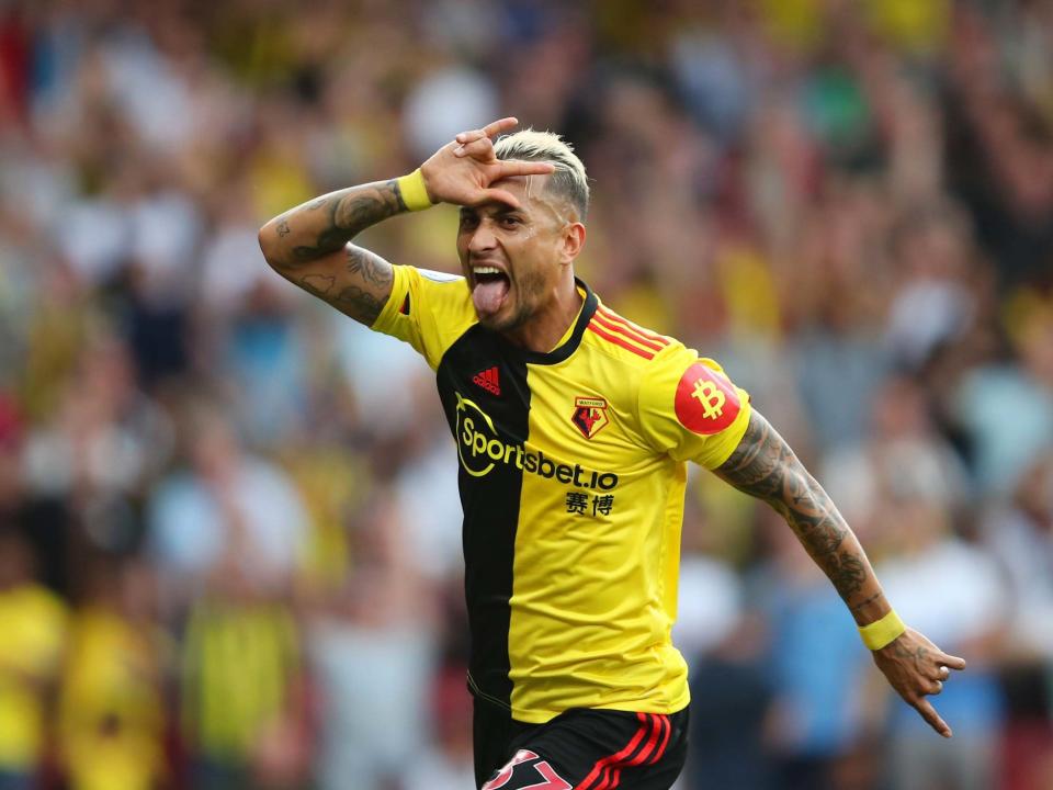 Pereyra celebrates his equaliser vs Arsenal: Getty