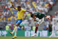 <p>Brazil’s Neymar, left, and Mexico’s Edson Alvarez go for a header during their round of 16 match at the 2018 soccer World Cup in the Samara Arena, in Samara, Russia, Monday, July 2, 2018. (AP Photo/Eduardo Verdugo) </p>