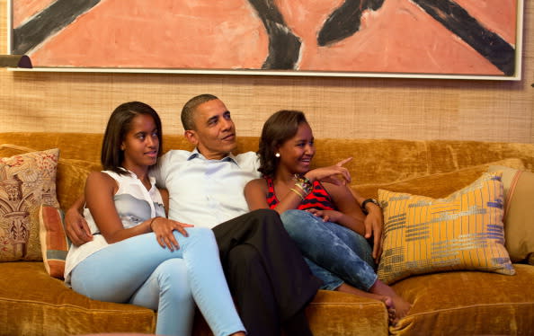 In this handout photo provided by The White House, U.S. President Barack Obama and his daughters, Malia (L) and Sasha, watch on television as first lady Michelle Obama takes the stage to deliver her speech at the Democratic National Convention on September 4, 2012 in the Treaty Room of the White House in Washington, DC. The DNC that will run through September 7, will nominate U.S. President Barack Obama as the Democratic presidential candidate. (Photo by Pete Souza/White House Photo via Getty Images)