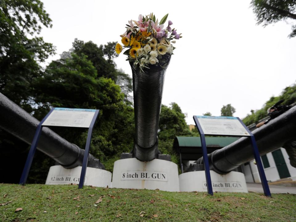 A World War II cannon is stuffed with flowers at Fort Siloso, a preserved coastal fort on the island of Sentosa, Singapore, on June 9, 2018,